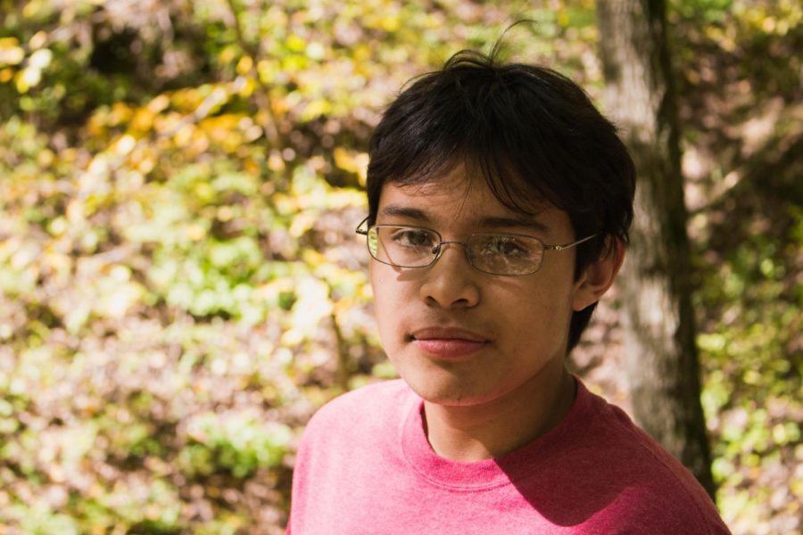 Andres poses for a photo in Ledges state park, one of his favorite nature retreats.