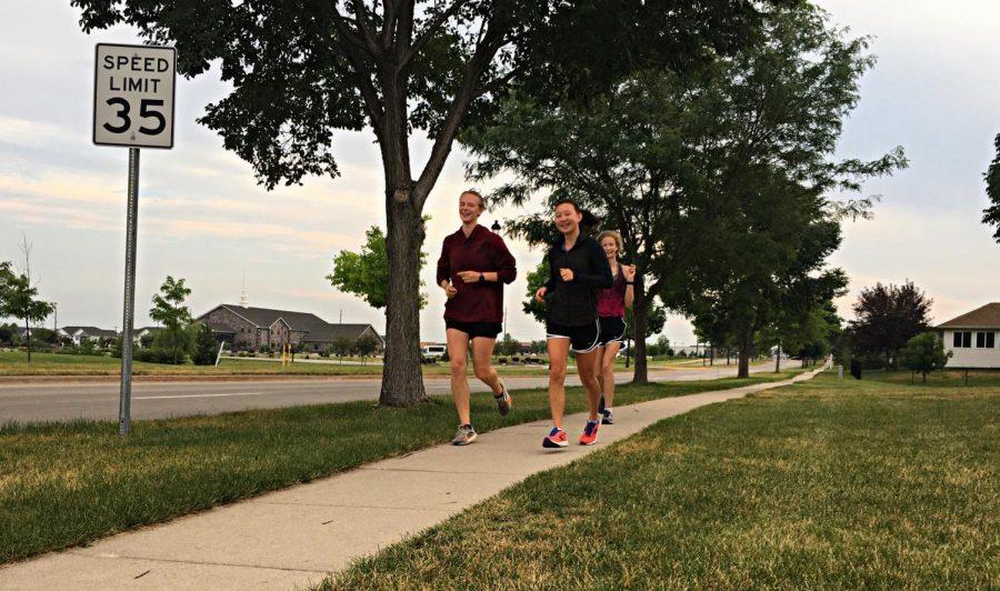 Claire%2C+Emily+and+Kiah+finishing+the+last+mile+of+their+24-hour+challenge.+