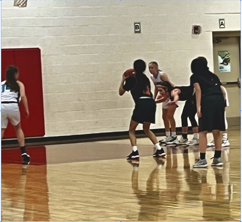 Sophia Hatcher throws a free throw at her club game in 2021.