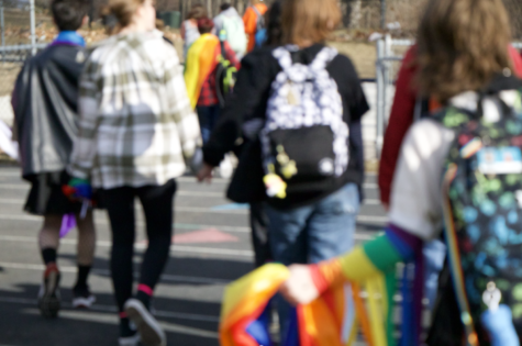 Ames High students leave the football field at the end of the walkout on Wednesday, March 1st. 