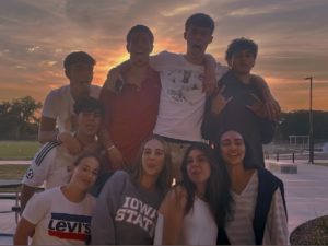 Spanish exchange students at Ames High pose for a photo on their last night in Ames. 