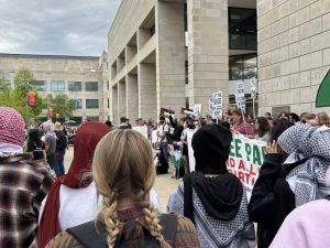 Student demonstrators protesting in support of Palestine in front of Parks Library.