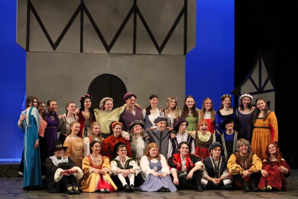 Ames High theater students pose for a picture onstage