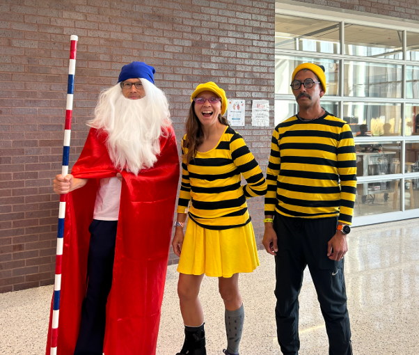 The cross country coaches all dressed up for the Where's Waldo run.